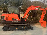 2023 Doosan DX60-9C mini excavator side view