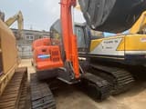 2019 Doosan DX55 crawler excavator, rear three-quarter view