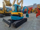 2022 Kubota KX155 mini excavator, rear three-quarter view