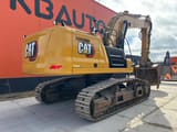 2022 Caterpillar 340 crawler excavator, rear three-quarter view