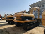 2023 Caterpillar 320CL crawler excavator, rear three-quarter view