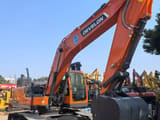 2026 Develon DX225 crawler excavator, side view