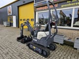 2023 Schaeff TC08 mini excavator, rear three-quarter view