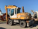 2002 Liebherr A312 wheel excavator, side profile view