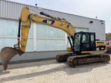 2012 Caterpillar 319D crawler excavator, side view