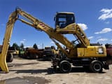 2006 Komatsu PW220MH material handler, side view