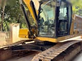 2022 Caterpillar 333 crawler excavator, front three-quarter view