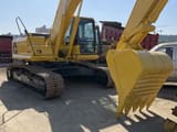 Komatsu PC240 LC crawler excavator, front three-quarter view