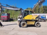 1999 Volvo EW160 wheel excavator, side view