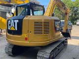 2024 Caterpillar 308E2 mini excavator rear three-quarter view