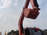 Hitachi ZX70 crawler excavator, close-up of boom and bucket