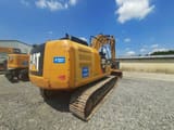 2017 Caterpillar 323FL crawler excavator, rear three-quarter view