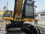 2023 Caterpillar 340D crawler excavator, rear-quarter view