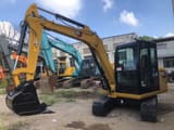 2011 Caterpillar 305.5E mini excavator, front three-quarter view