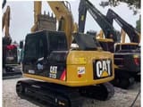 2025 Caterpillar 312D crawler excavator, rear three-quarter view