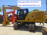 2023 Caterpillar 320GC crawler excavator, side view