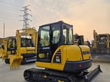 2024 Komatsu PC56 mini excavator, rear three-quarter view