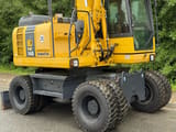 2011 Komatsu PW148 wheel excavator side view
