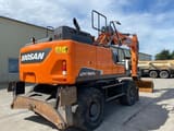 2021 Doosan DX160W wheel excavator, rear three-quarter view