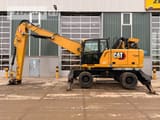 2020 Caterpillar MH3024-06C material handler, side view