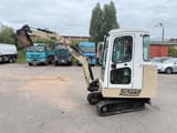 1995 Schaeff HR 12 mini excavator side view