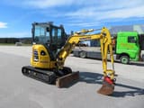 2020 Komatsu PC26 MR-5 mini excavator, front three-quarter view