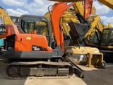 2019 Doosan DX60 crawler excavator, side view