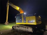 2025 Komatsu PC210LC-11 crawler excavator, rear three-quarter view