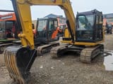 Caterpillar 307E mini excavator, front three-quarter view