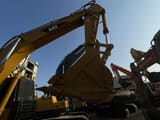 2010 Caterpillar 325BL crawler excavator boom and bucket view