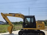 2022 Caterpillar 312D2 excavator, side view