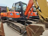 Doosan DH55 mini excavator, side view