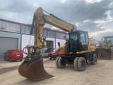 2022 Caterpillar M319-07B wheel excavator, front three-quarter view
