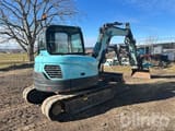 2015 Bobcat E62 mini excavator, rear three-quarter view
