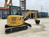 2024 Caterpillar 303.5E mini excavator, side view
