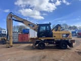 2011 Caterpillar M322D MH material handler, side view