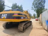 Caterpillar 330BL crawler excavator, rear three-quarter view