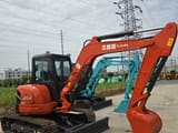 2021 Kubota U55-4 mini excavator, side view