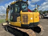 2017 Komatsu PC118MR-8 mini excavator, rear three-quarter view