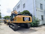 Caterpillar 330D crawler excavator, rear three-quarter view