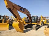 Caterpillar 329E crawler excavator, front three-quarter view