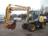 2011 New Holland WE150 wheel excavator side view