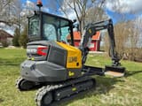2024 Volvo ECR40F mini excavator, rear three-quarter view