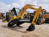 2020 Komatsu 55MR mini excavator, front three-quarter view