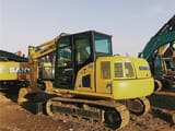 2024 Komatsu PC70-8 mini excavator, rear three-quarter view