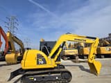 Komatsu PC70-8 mini excavator, side profile view