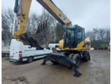 2007 Caterpillar M316D wheel excavator, front three-quarter view