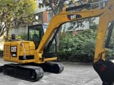 2024 Caterpillar 306E2 mini excavator, side profile view