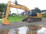 2026 Caterpillar 323D3 crawler excavator, side profile view