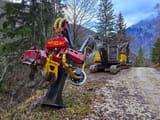 2005 Volvo EC210BNLC crawler excavator with forestry attachment
